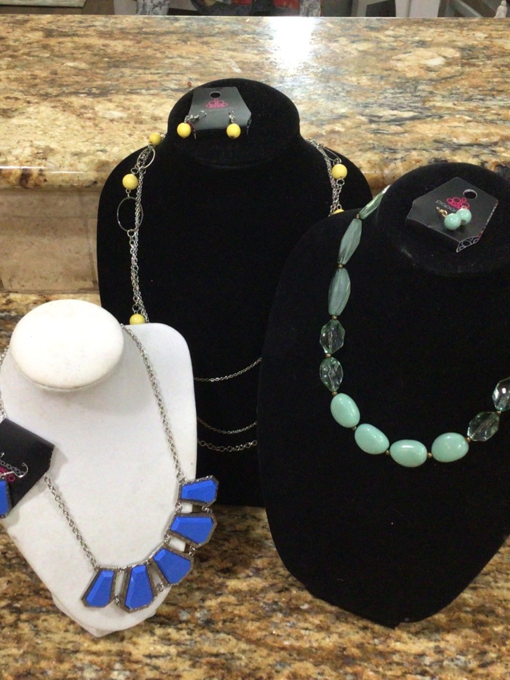 Lot of three brand new Paparazzi necklaces with matching earrings.  nwt